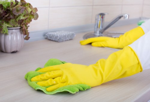 Professional carpet cleaning team reviewing site hazards and safety checks